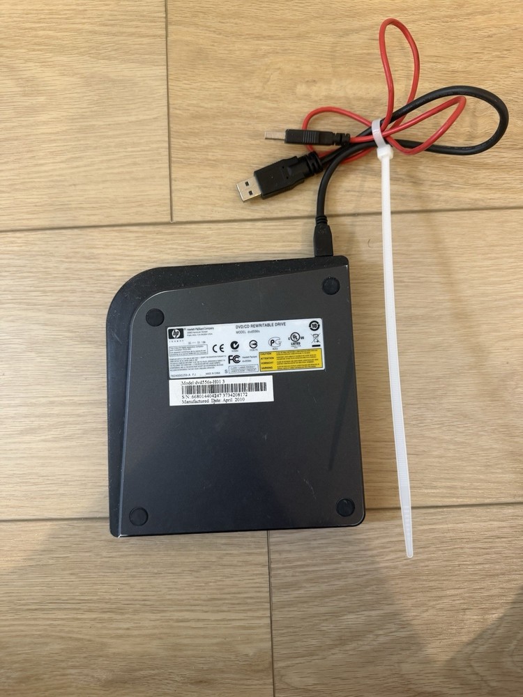 HP dvd 556S LightScribe External Slim Multi Format DVD Writer. EUC.