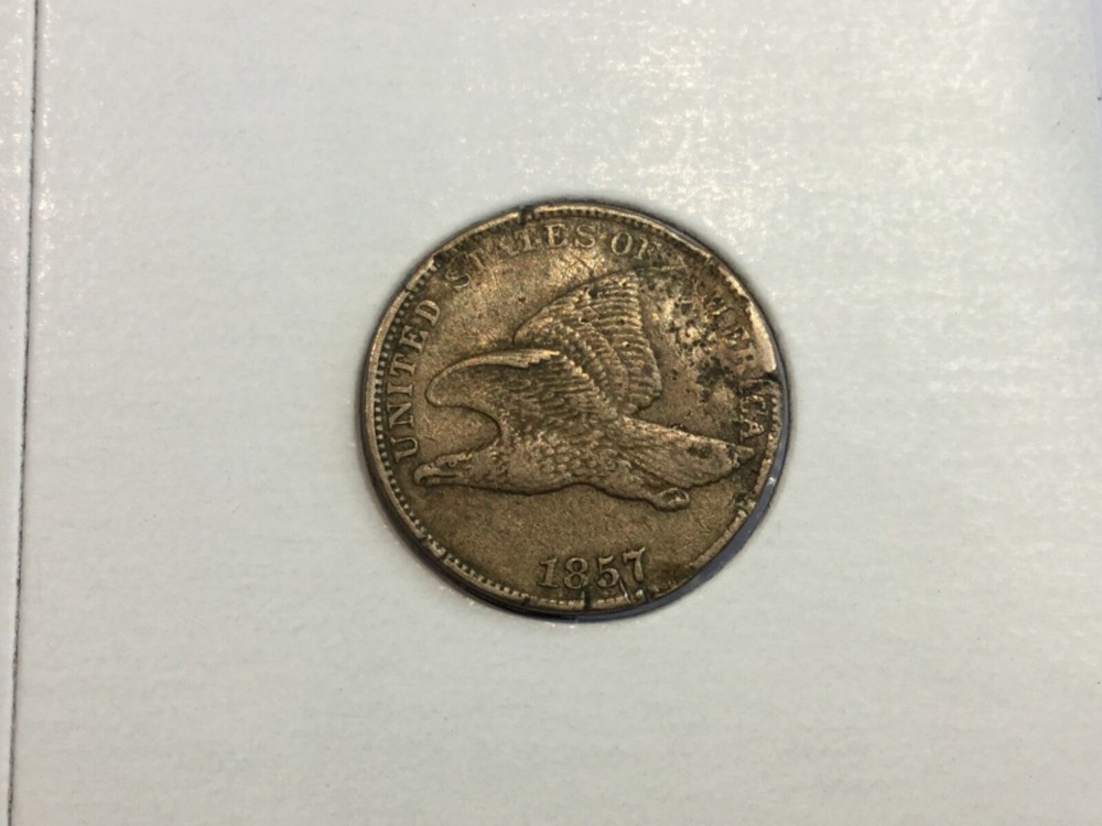 1857 Flying Eagle Cent in extra fine- reverse struck through