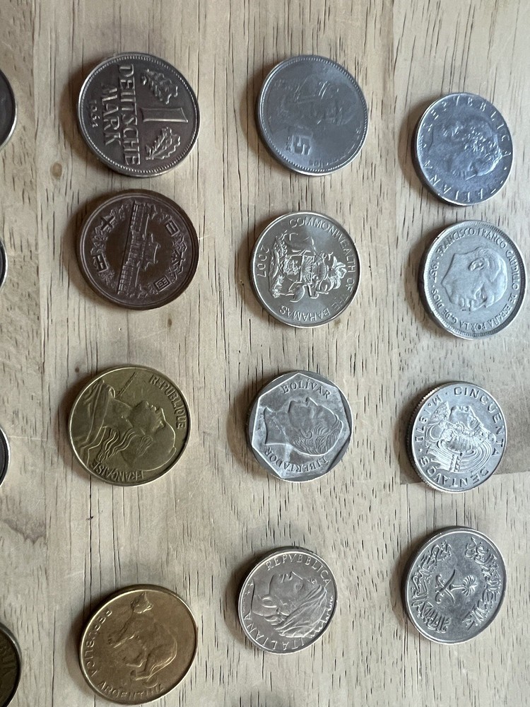 Assorted foreign coins. 26 Coins In Total