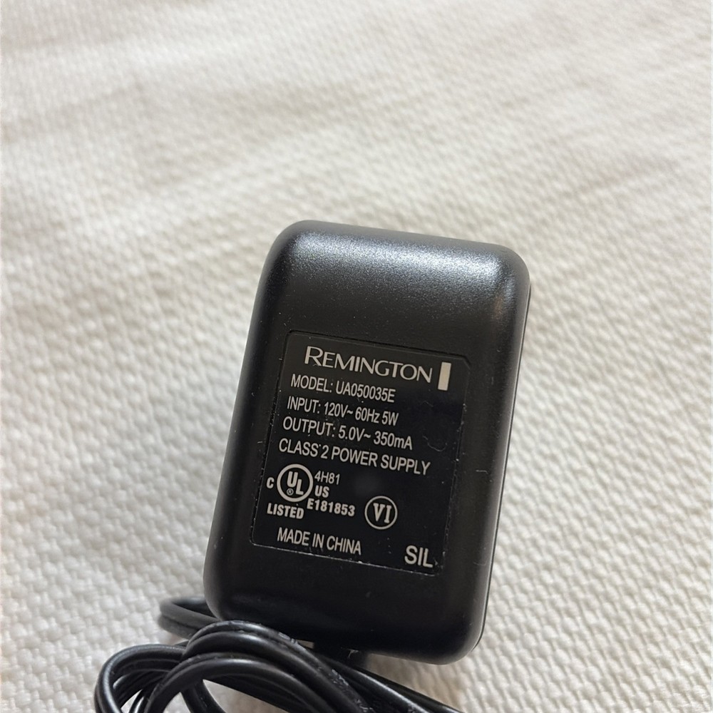 REMMINGTON CORDLESS RAZOR MODEL # UA 050035E