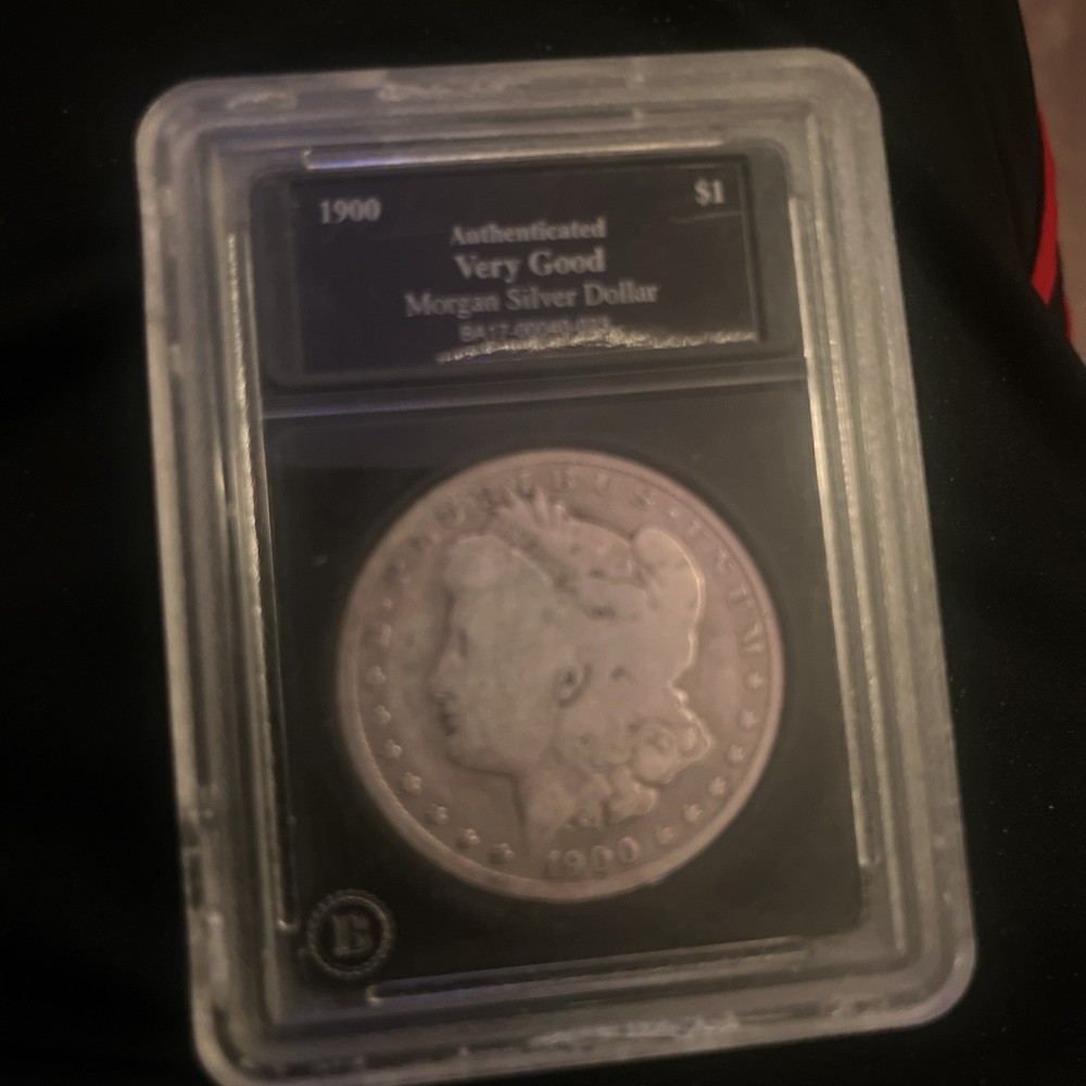 Morgan silver dollar. 1900-O And 1901-O.