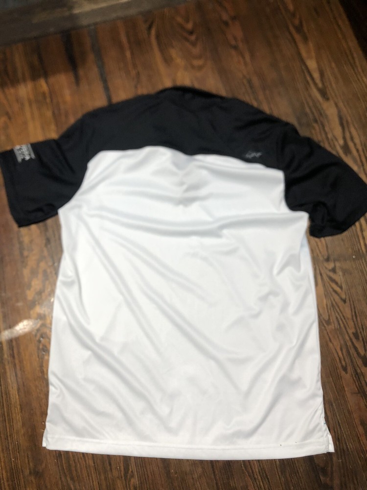 Greg Norman - Golf Shirt- Medium (new with tags)