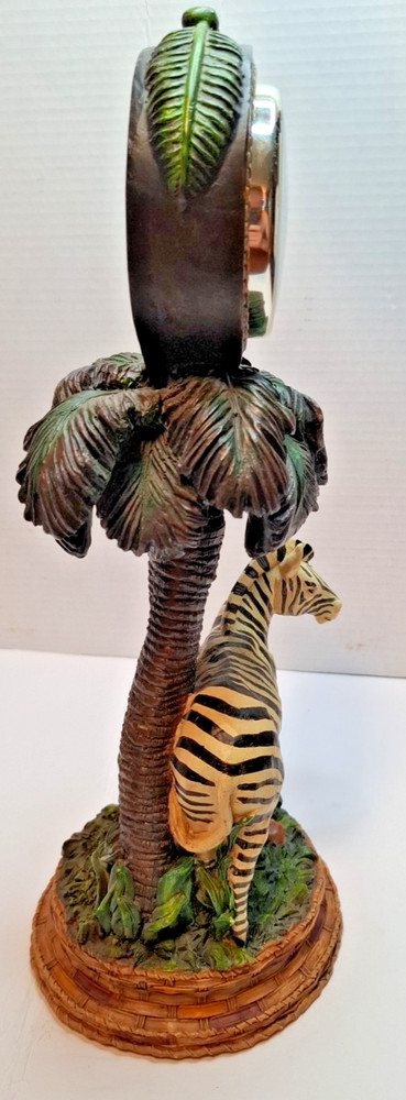 Zebra clock resin sculptured under palm trees 15"Ht. Functioning Clock