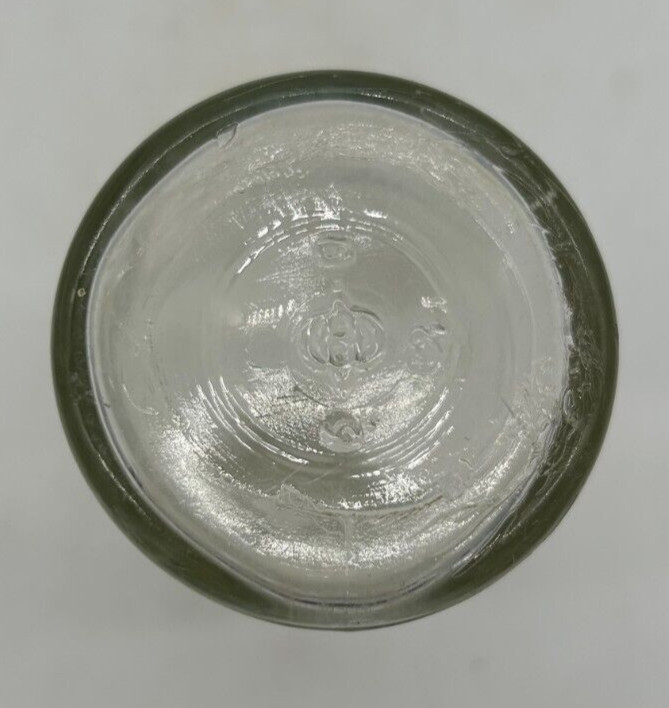 Clear small Fly Tox bottle with cork