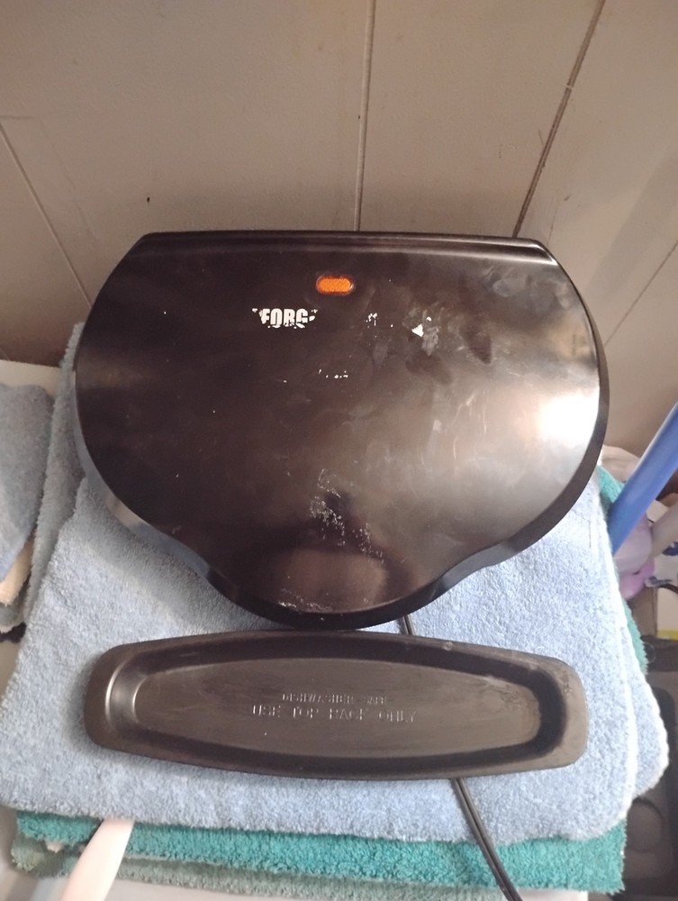 black george foreman grill with drip tray used