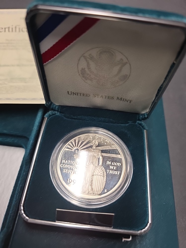 1996 national community service silver dollar Proof