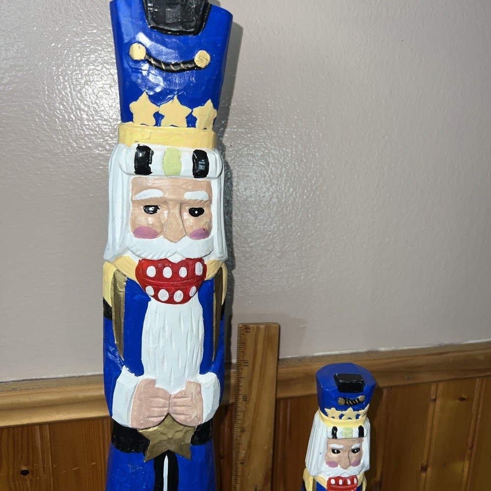 2 Tall decorative nutcracker figurines