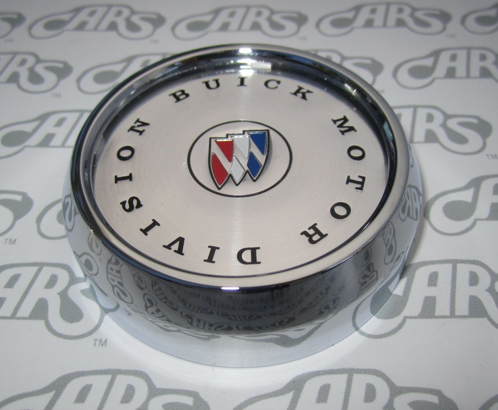 1971-1987 Buick Chrome Wheel Cap w/ Tri-Shield Plastic Emblem. OEM #1236446. 2"+