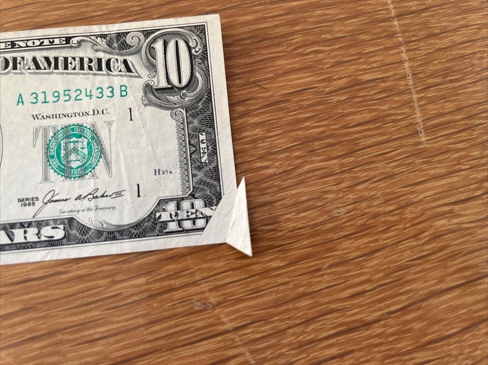 misprint and cut dollar bill