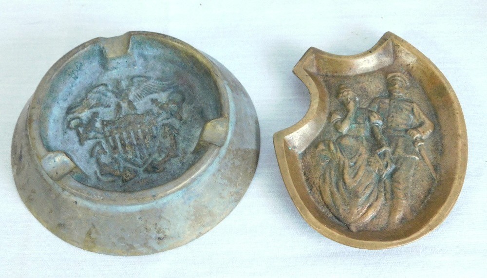 Two Early 20th C. Solid Brass Ashtrays - US Eagle Shield & Naughty Officer