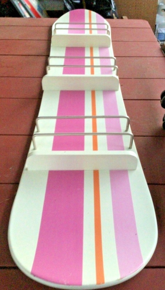 COMIC BOOK OR MAGAZINE RACK SNOWBOARD DESIGN