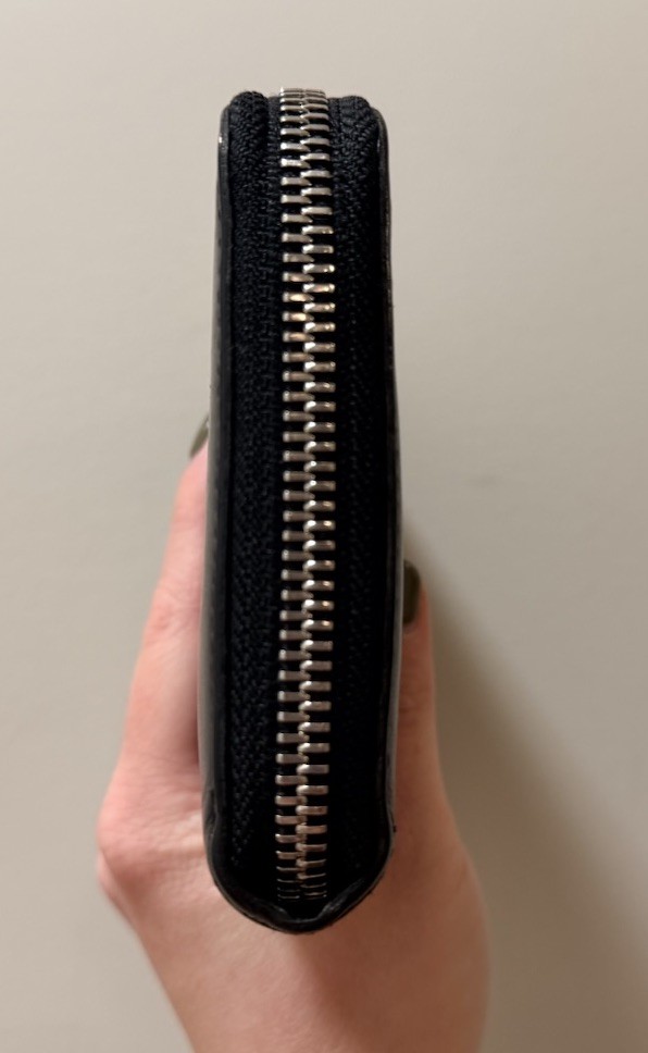 Authentic Louis Vuitton - Black Leather Zippy Wallet.