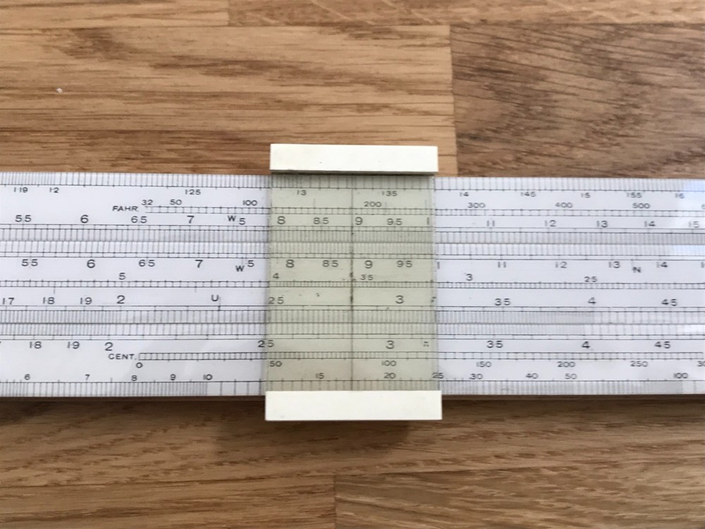 nice old good looking unique electrical slide rule in case
