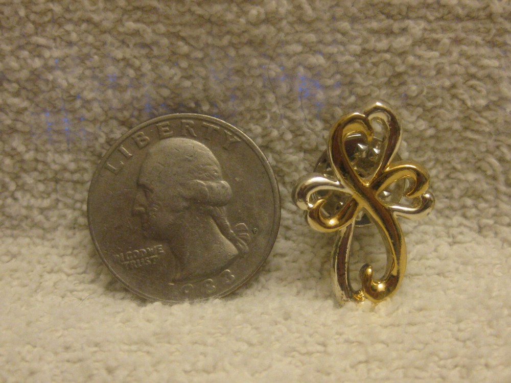 Vintage stylized cross pin