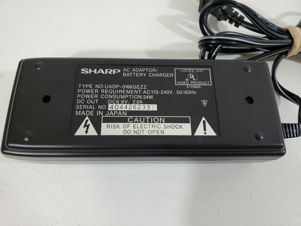 OEM sharp AC adapter battery charger type: UADP-0166GEZZ