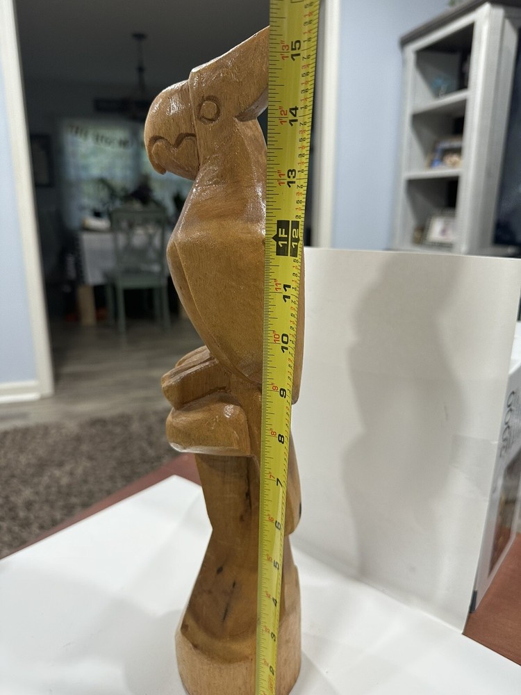 carved wooden parrot