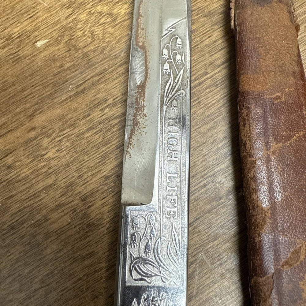 A GERMAN SOLINGEN DAGGER WITH ENGRAVED BLADE