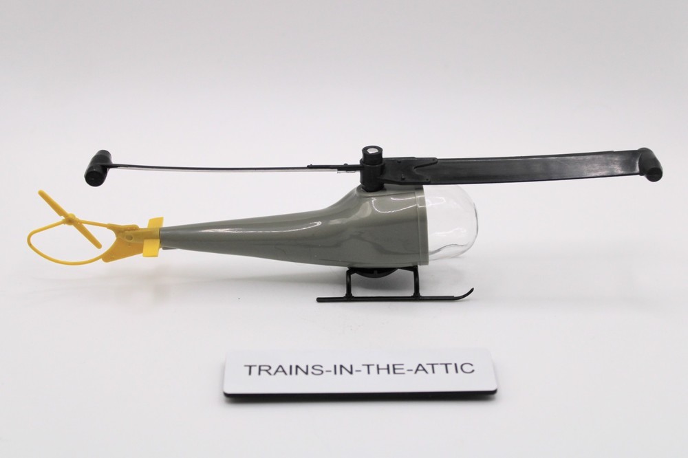 LIONEL 6819 STATIC LOAD NON FUNCTIONING  HELICOPTER  NEW W/BLACK BLADE.