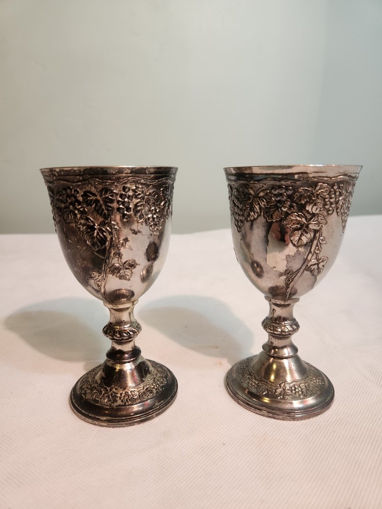 Vintage silverplate goblets featuring a raised grape vine pattern