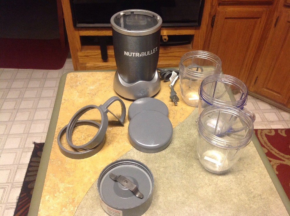 Nutribullet Magicbullet Blender Includes 3 - 20 Oz Cups , 9 pieces total*
