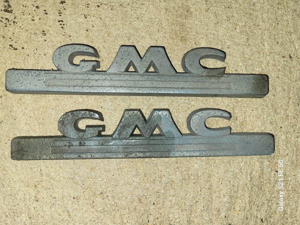 Two Vintage GMC 1947-1954 Hood Script Emblems 2223966