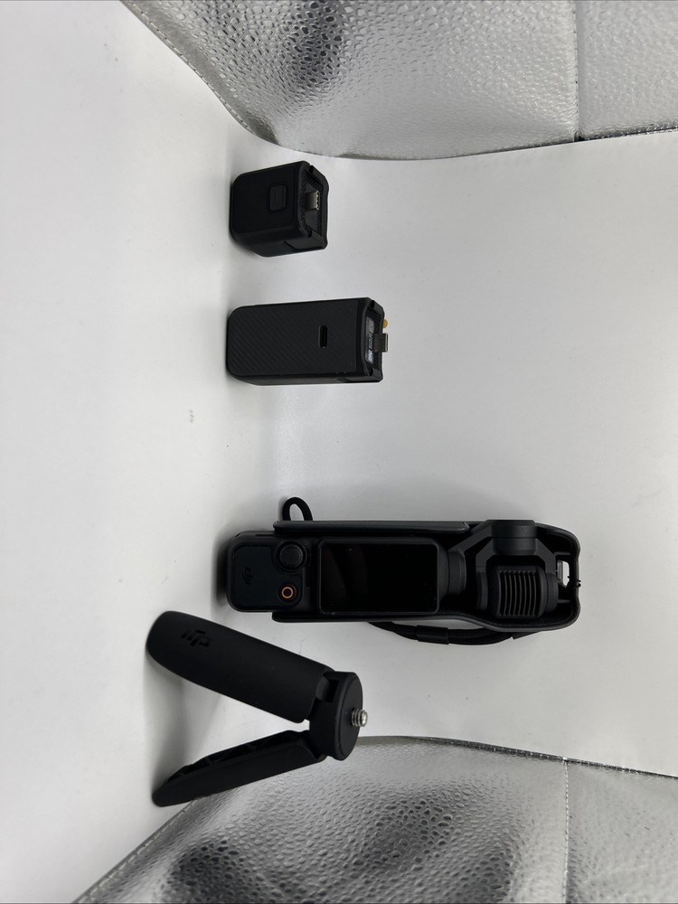 - DJI Osmo Pocket 3 Camera + Case And Tripod!
