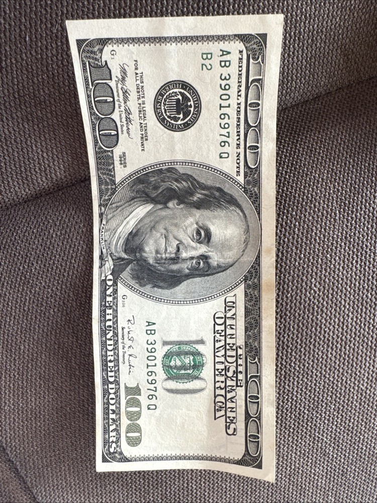 100 dollar bill cut error