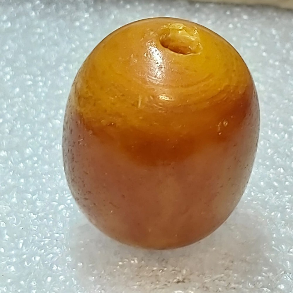 Ancient large amber cabochon bead