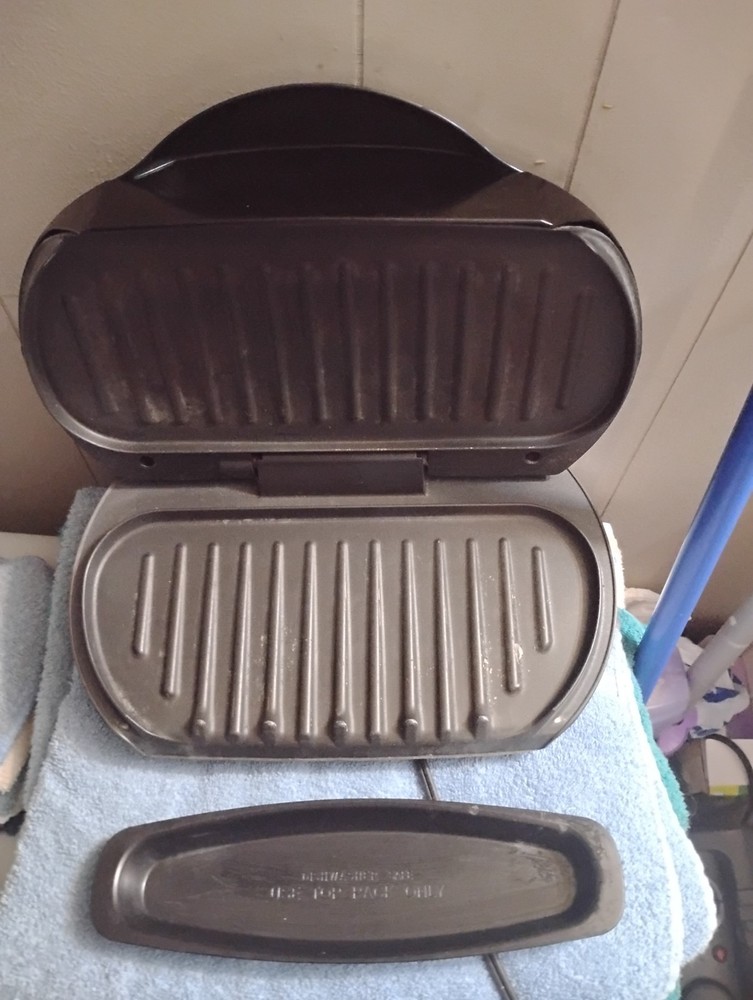 black george foreman grill with drip tray used