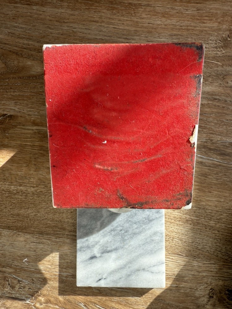 Vintage marble bookends with spherical elements.