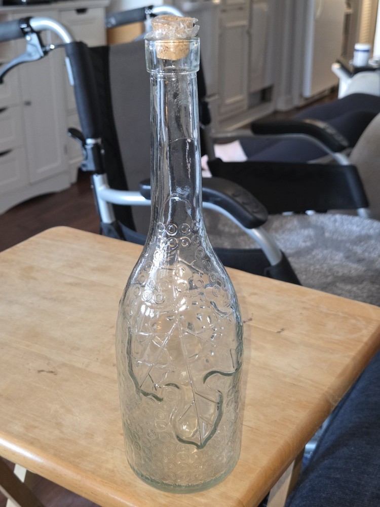 Decorative Clear Glass Bottle with Embossed Leaf Pattern