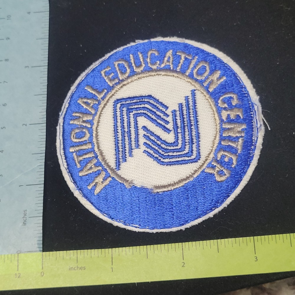 National Education Center Embroidered blue white silver patch