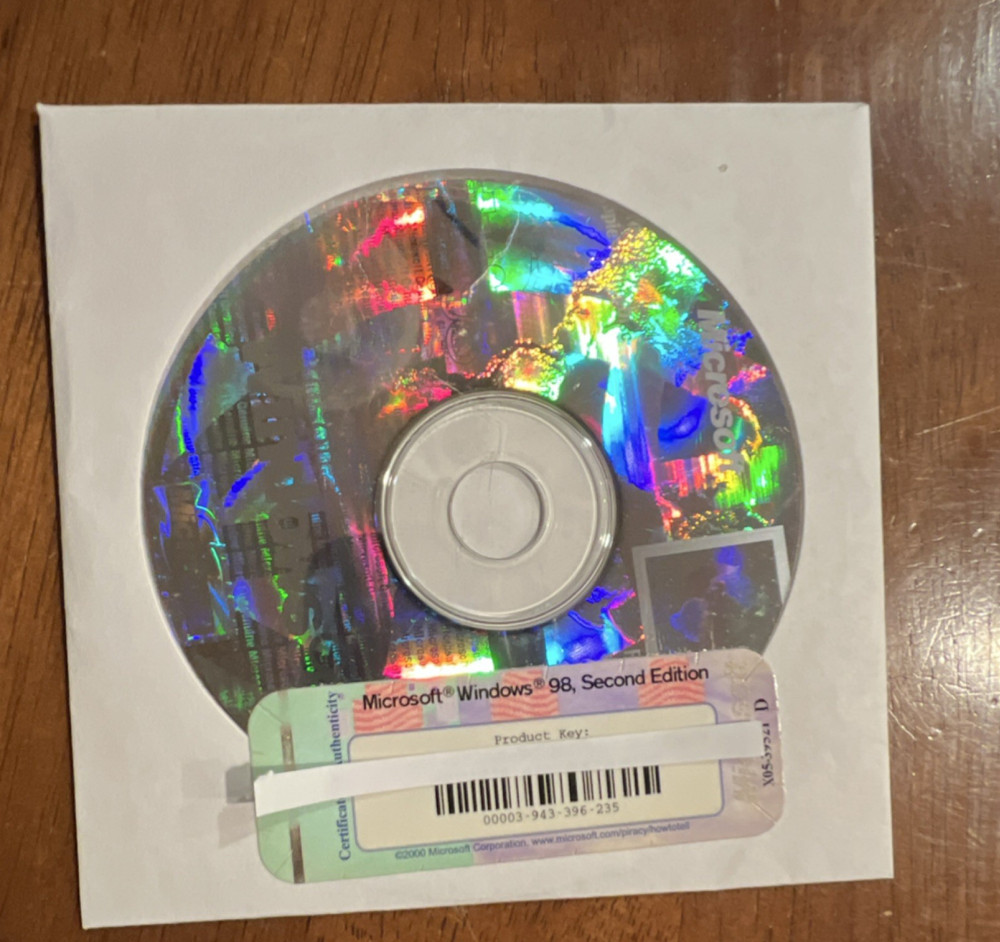 Microsoft Windows 98 Second Edition CD PLUS98 OS and Win98 Starts Here