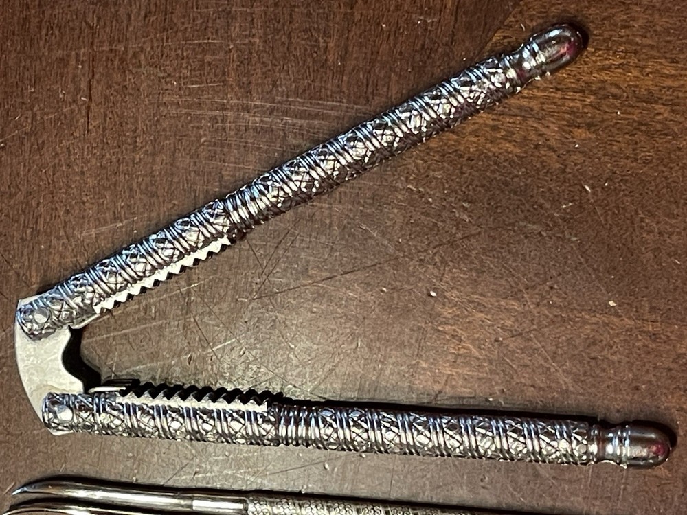 Vintage Handheld Metal Nutcracker w/ 4 picks