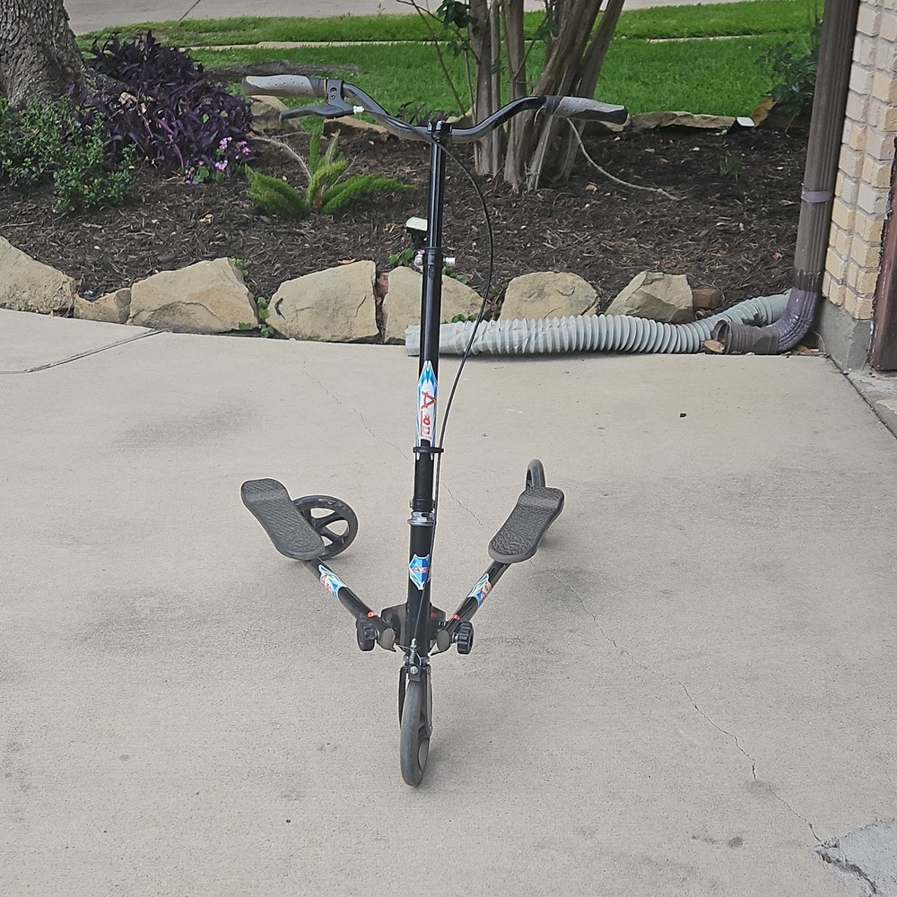 Trikke Black Folding Scooter with Adjustable Handlebars and Two-Platform Design