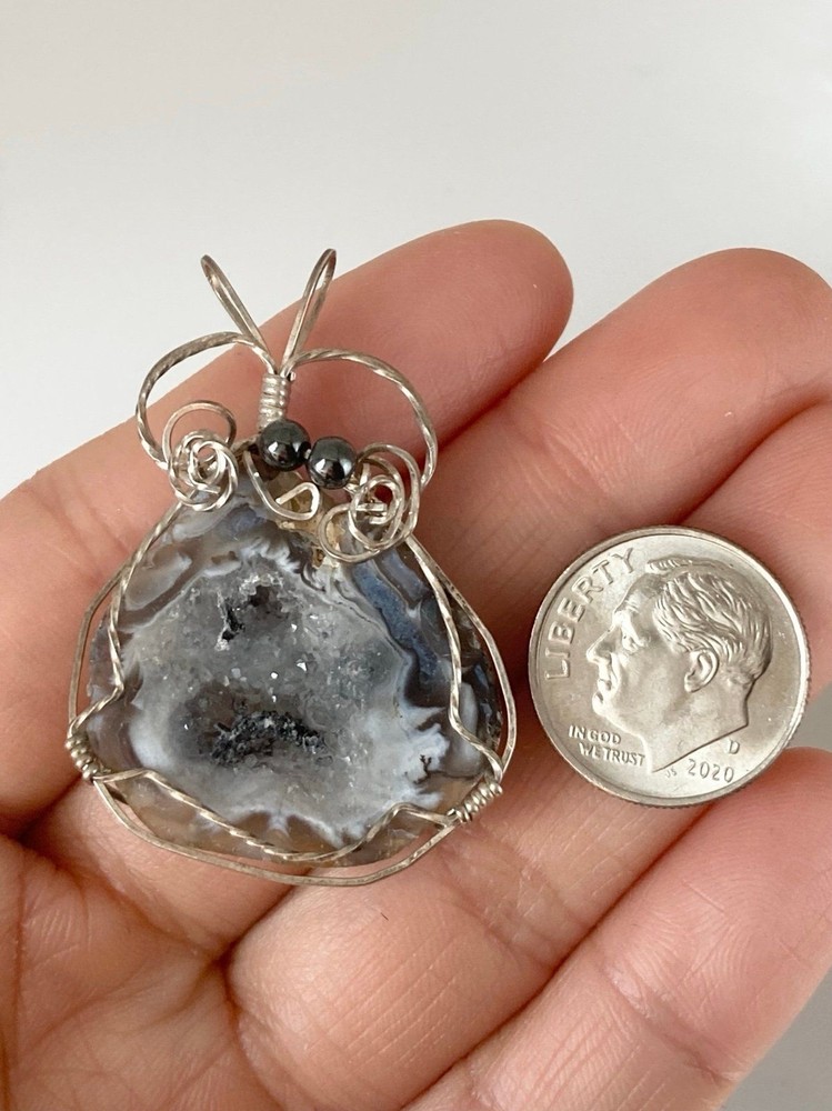 Handcrafted silver wire geode agate pendant