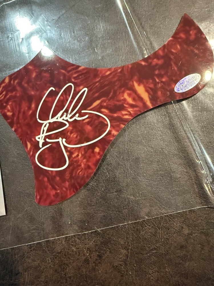 Usher Signed Pick Guard (TSA COA)