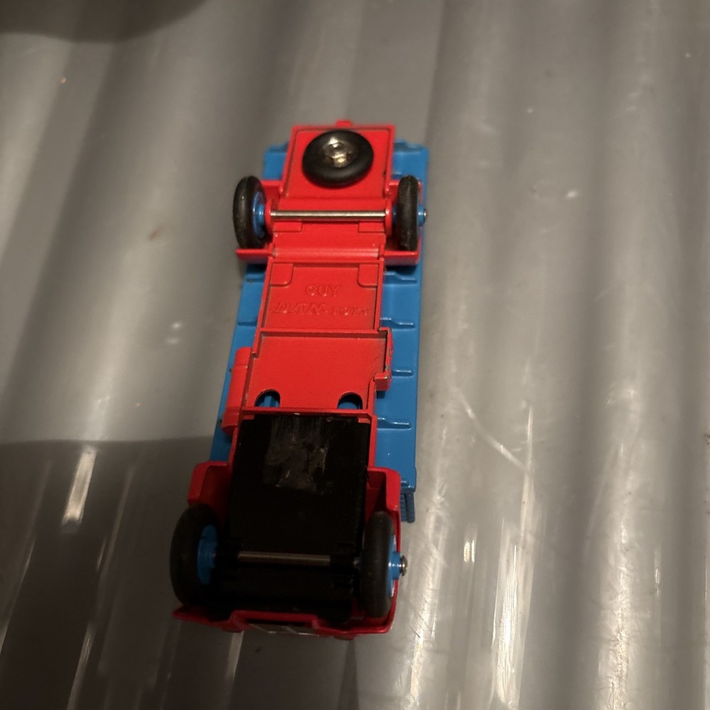 DINKY GUY FLATBED 1950s.red & light blue .