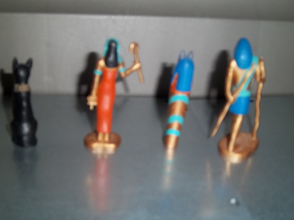 4 Multicolored Egyptian Figures: Anubis, Bastet, Thoth, and Isis