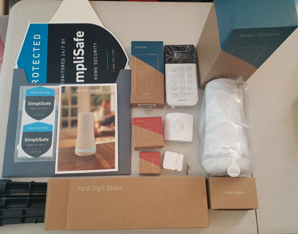 SIMPLI SAFE HOME INDOOR SECURITY SYSTEM. 4 piece system with manual