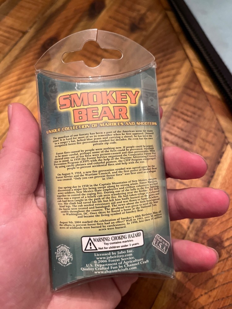 New in package 2006 Smokey Bear 16 Marble kit