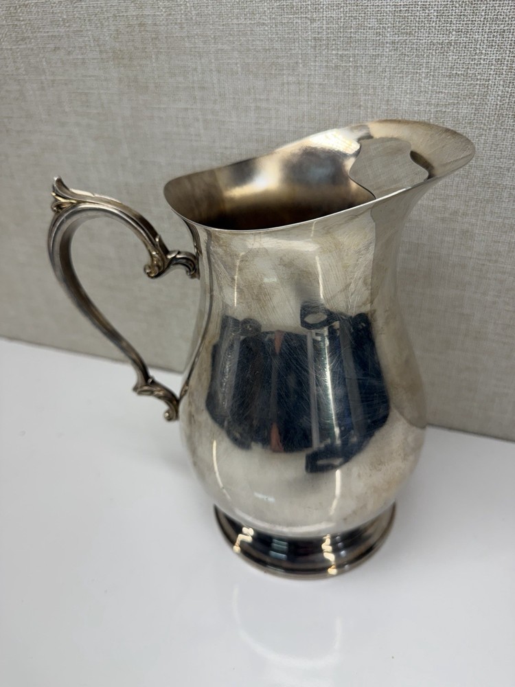 Vintage Silver Plated Cream Pitcher Footed Ornate Handle 9in