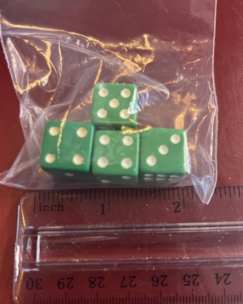 Lot of 4 green Dice.
