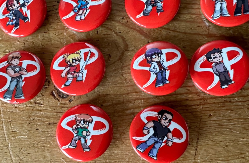 SCOTT PILGRIM VS THE WORLD THE GAME SDCC 2010 COMIC CON PINS BRYAN LEE BUTTON