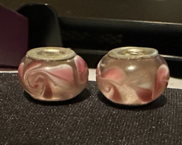 two matching pink patterned charms For Charm Braeclets