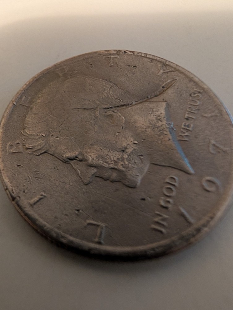 1971 Half Dollar Struck Through Wire And Error On His Cheek