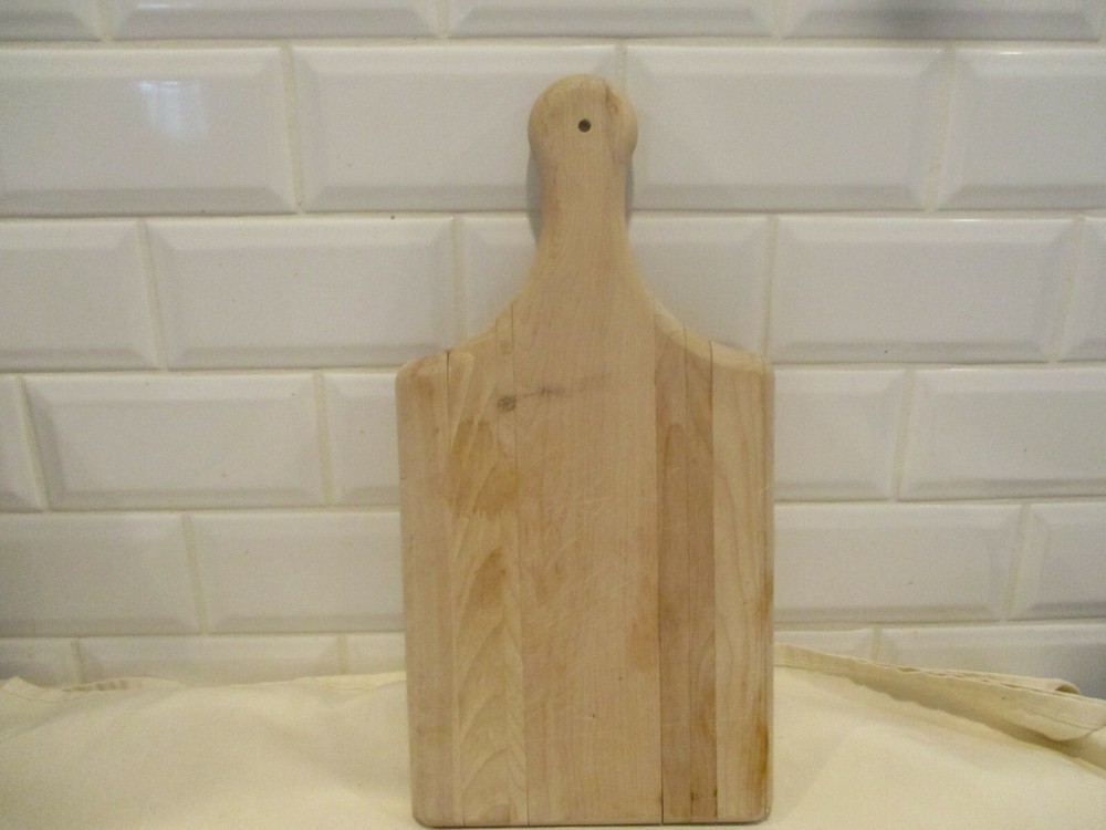 Watertown Savings Bank Cutting board with handle.