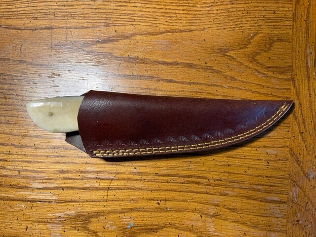 Nice Damascus deep belly caper with white bone stocks & leather sheath