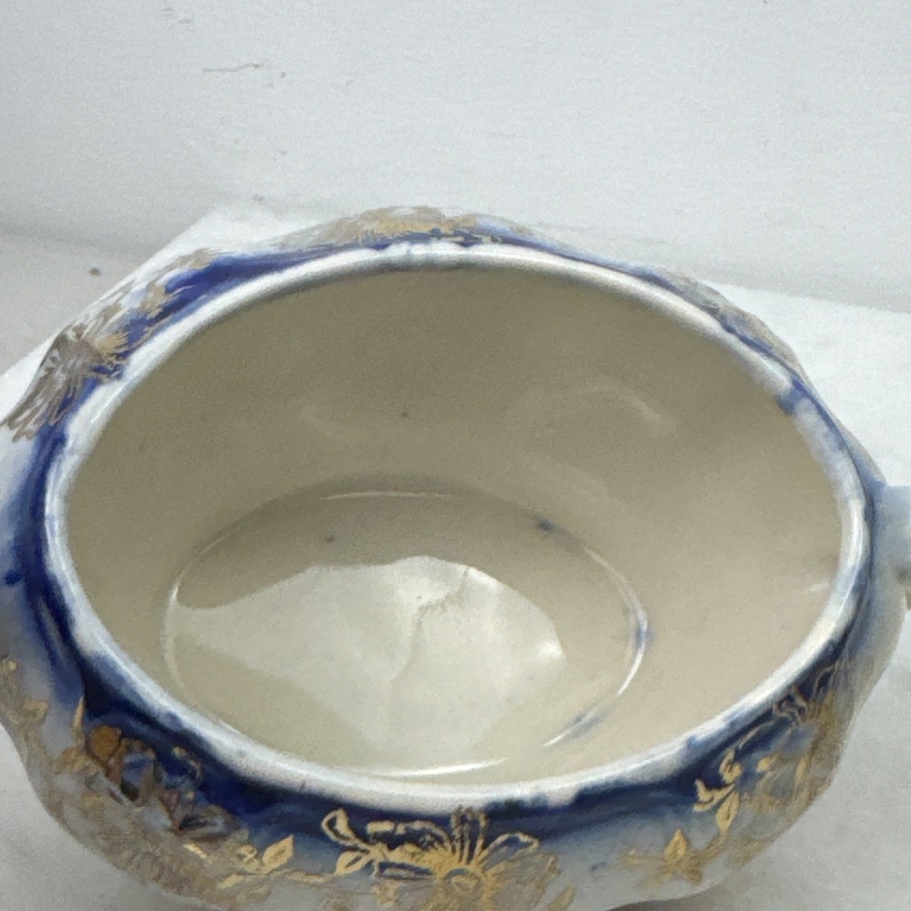 Porcelain Petipoint Creamer and sugar