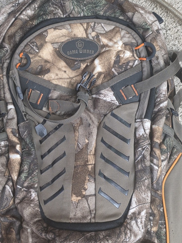 Game Winner Camouflage Hydration Backpack Tons of pockets. Rain Fly
